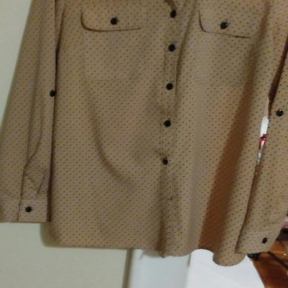 Women's button down shirt.